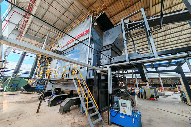 越南家具廠(chǎng)SZW15-1.25-SS 15噸生物質(zhì)往復(fù)爐排蒸汽鍋爐